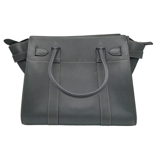 337 - Beautiful Mulberry Grey Handbag.
Quality soft leather, with top, single zip lock-up. Gold tone hardw... 