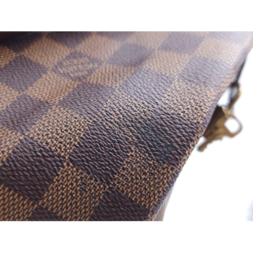 366 - A Louis Vuitton Speedy Damier Ebene Handbag. A leather exterior, with two rolled handles, gold toned... 