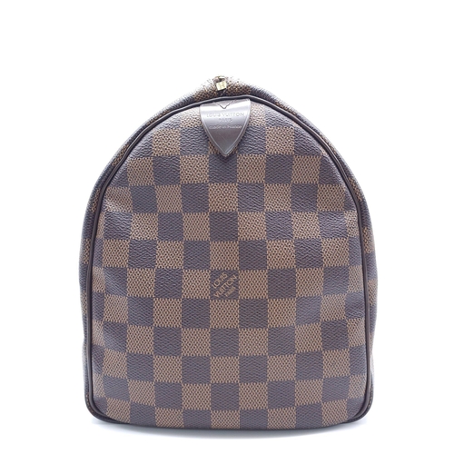 366 - A Louis Vuitton Speedy Damier Ebene Handbag. A leather exterior, with two rolled handles, gold toned... 