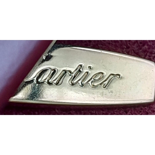 402 - Cartier Burgundy Shoulder Bag.
Quality soft leather exterior with rich suede accents, embossed C mot... 