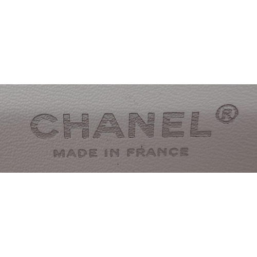 11 - Timeless Chanel Double Flap Bag.
Limited edition, it is part of the Metier d'Art collection year 201... 