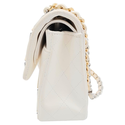 11 - Timeless Chanel Double Flap Bag.
Limited edition, it is part of the Metier d'Art collection year 201... 