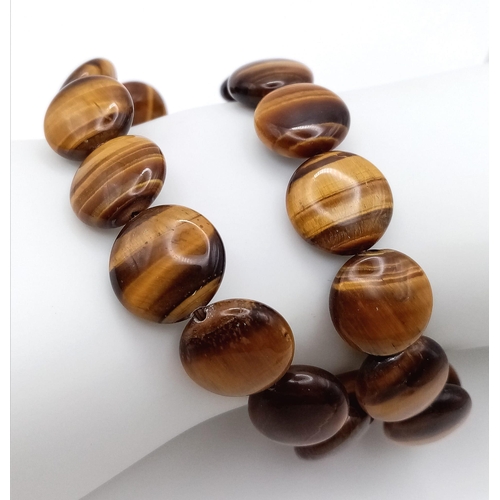 1283 - Two Ex Display Tigers Eye Stretch Fit Bracelets. 6cm Inner width at rest.
1.4cm Wide. Each weigh 32 ... 