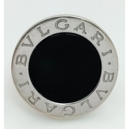 178 - A Bulgari White Gold and Onyx Ring. A stand-out piece in circular branded white gold and black onyx.... 