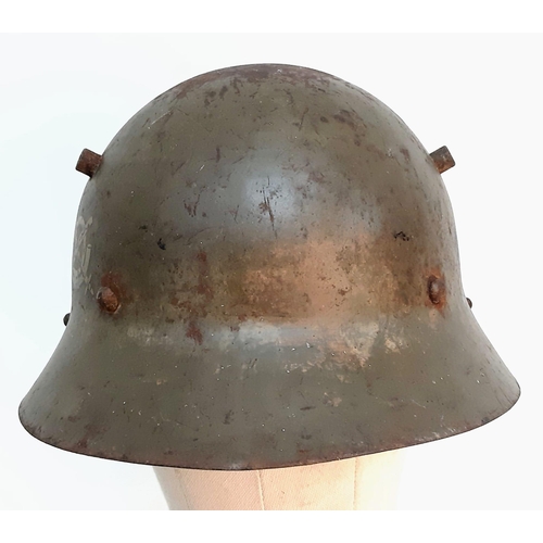 179 - Spanish Civil War Czech M30 Helmet with insignia of Franco’s Fascist 46th Infantry Badge. No liner.