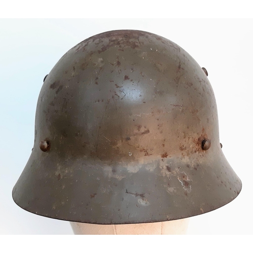 179 - Spanish Civil War Czech M30 Helmet with insignia of Franco’s Fascist 46th Infantry Badge. No liner.