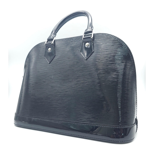 204 - A Louis Vuitton Black 'Alma' Bag. Patent epi leather exterior with rolled handles, silver toned hard... 