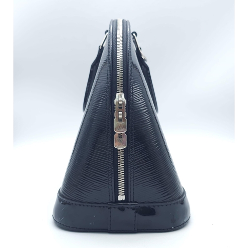 204 - A Louis Vuitton Black 'Alma' Bag. Patent epi leather exterior with rolled handles, silver toned hard... 