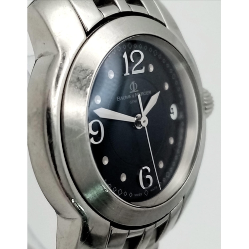 281 - A BAUME AND MERCIER LADIES STAINLESS STEEL WRIST WATCH WITH BLACK DIAL , DATE BOX , AUTOMATIC MOVEME... 