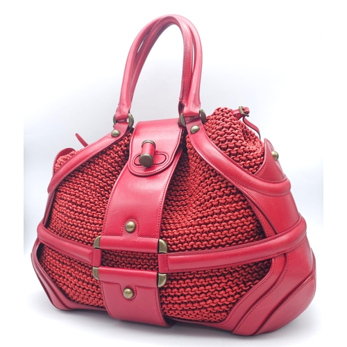 79 - Alexander McQueen Red Woven Coated Canvas and Leather Novak Satchel.
Versatile and functional, well-... 