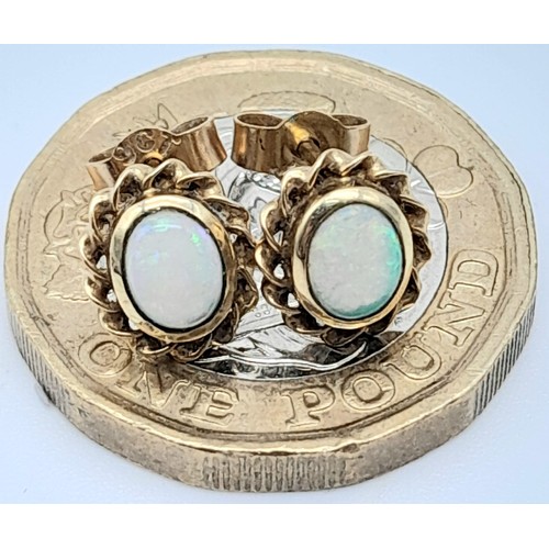 854 - A PAIR OF 9K YELLOW GOLD OPAL STUD EARRINGS 1G