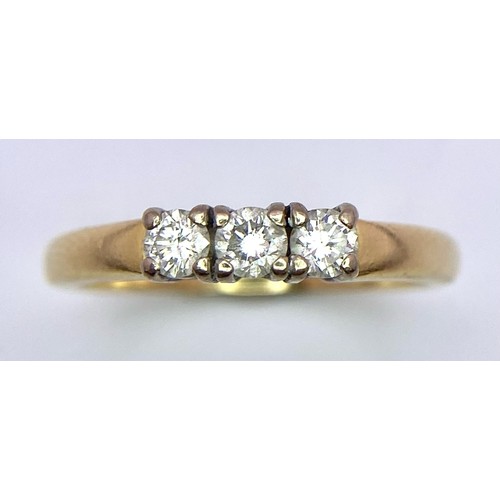 568 - 18K YELLOW GOLD TRILOGY DIAMOND RING WITH APPROX 0.25CT TOTAL, WEGHT 3.4G SIZE M