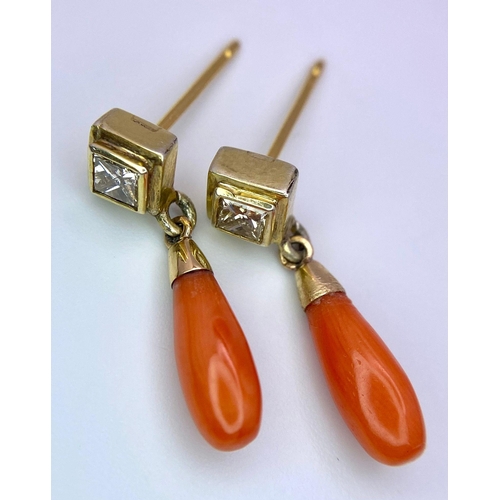 1087 - A PAIR OF 0.25ct DIAMOND EARRINGS WITH A CORAL DROP SET IN 18K GOLD .    2.4gms