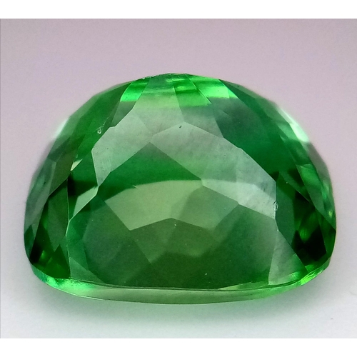 1312 - A 20.5ct Pale Green Apatite Gemstone. Rectangular cut with a trillion base. No visible marks or incl... 