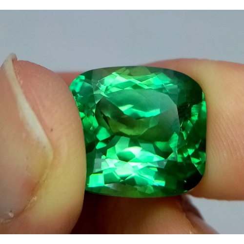 1312 - A 20.5ct Pale Green Apatite Gemstone. Rectangular cut with a trillion base. No visible marks or incl... 