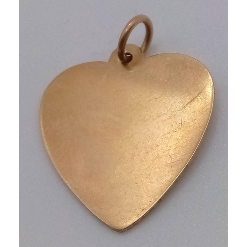 1630 - A 9CT gold heart pendant/charm. Total weight 2.2G.