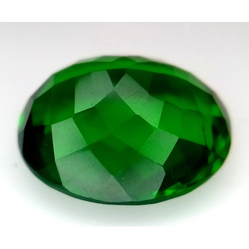 1650 - An Alluring 14ct Green Diopside Gemstone. Oval faceted cut with no visible marks or inclusions. No c... 