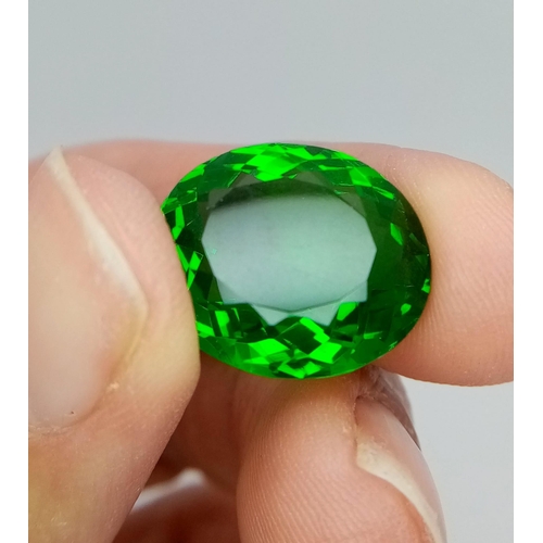 1650 - An Alluring 14ct Green Diopside Gemstone. Oval faceted cut with no visible marks or inclusions. No c... 