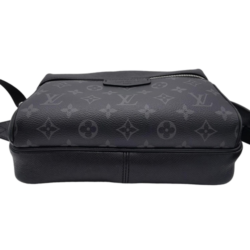 253 - Louis Vuitton Outdoor Messenger Bag.
A subtle tone-on-tone design with silver-colour hardware for a ... 