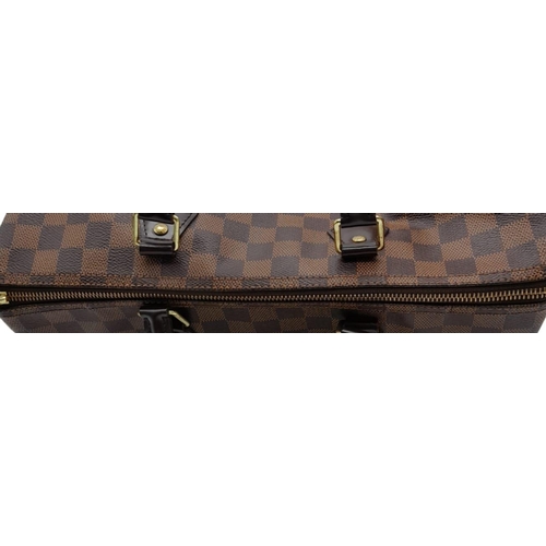 295 - A Louis Vuitton Damier Ebene Speedy 35 Bag. Leather exterior with two rolled leather handles, gold t... 