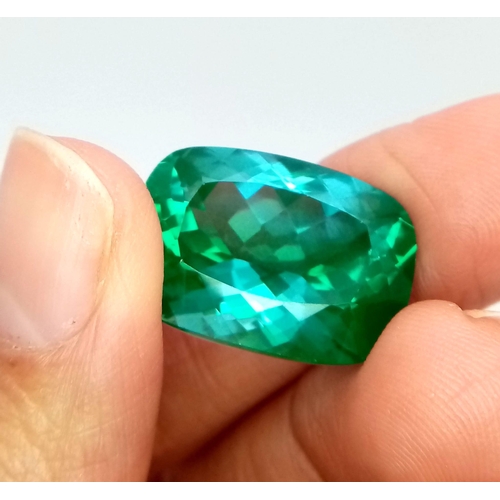 333 - An 28ct Attractive Blue/Green Tourmaline Gemstone. Rectangular cut. Well faceted. No visible marks o... 