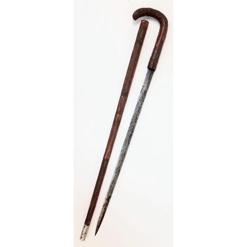 368 - An Antique and Rare, Leather Covered Sword Stick. 
74cm Length.