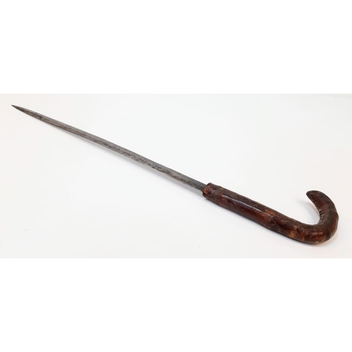 368 - An Antique and Rare, Leather Covered Sword Stick. 
74cm Length.