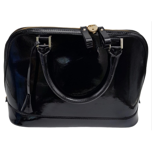 430 - An Aspinal Black Hepburn Bag. Patent leather exterior with rolled leather handles, gold toned hardwa... 