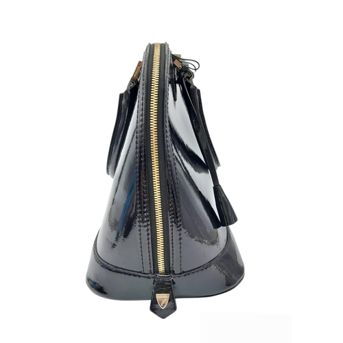 430 - An Aspinal Black Hepburn Bag. Patent leather exterior with rolled leather handles, gold toned hardwa... 