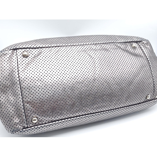 115 - Chanel Grey Perforated Leather Classic Flap Accordion Bag. 
Crafted from perforated leather, the bag... 