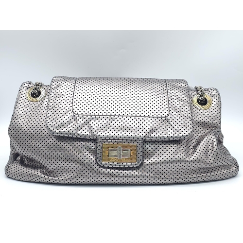 115 - Chanel Grey Perforated Leather Classic Flap Accordion Bag. 
Crafted from perforated leather, the bag... 