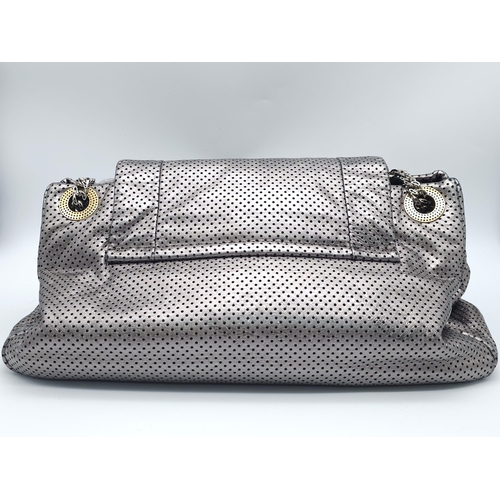 115 - Chanel Grey Perforated Leather Classic Flap Accordion Bag. 
Crafted from perforated leather, the bag... 