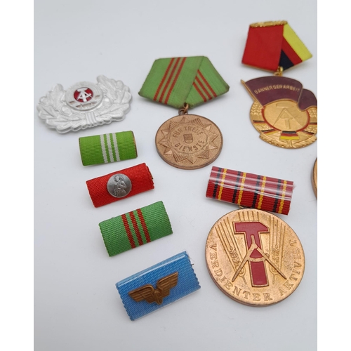 1165 - A collection of former East German Medals and Medallions.