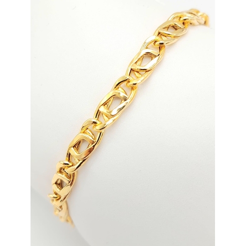 1263 - An Unworn, Ex Display, Italian Sterling Silver Gilt Curb Link Bracelet. 
19cm Length. 4.66 Grams. In... 