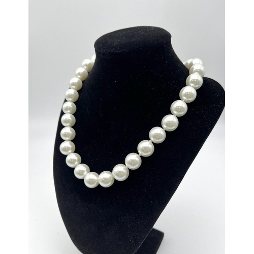 1265 - A Large White Beaded South Sea Pearl Shell Necklace. 14mm beads. Heart clasp. 42cm necklace length.