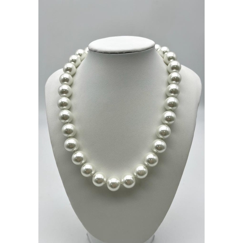 1265 - A Large White Beaded South Sea Pearl Shell Necklace. 14mm beads. Heart clasp. 42cm necklace length.