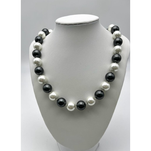 1305 - A Delightful Two-Tone South Sea Pearl Shell Large Bead Necklace. White and Silver 14mm shell beads. ... 