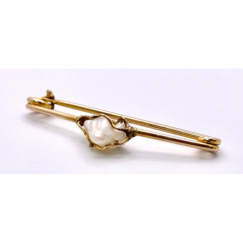 1325 - An Antique Set of 9K Gold and Small Baroque Pearl Jewellery. A safety pin brooch and pair of drop ea... 