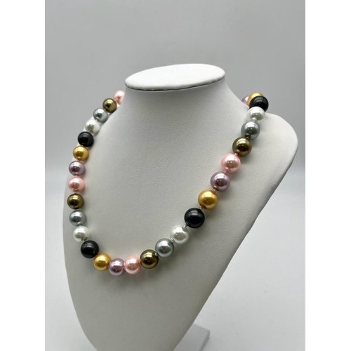 1448 - A Bewitching Six Colour South Sea Pearl Shell Bead Necklace. 
Silvers, pink, lavender and shades of ... 