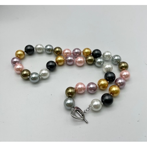 1448 - A Bewitching Six Colour South Sea Pearl Shell Bead Necklace. 
Silvers, pink, lavender and shades of ... 