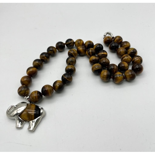 1507 - A Jungle-Esque Themed Tigers Eye Necklace with Hanging Tigers Eye Elephant Pendant! 12mm beads. Pend... 