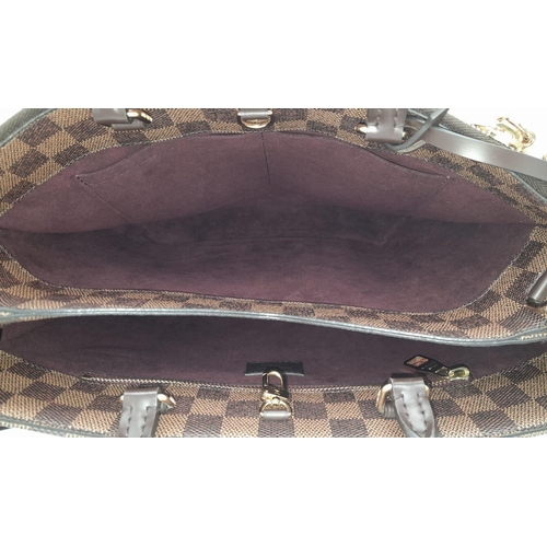 18 - A Louis Vuitton Damier Ebene Brampton Handbag. Leather exterior with two rolled leather handles, gol... 