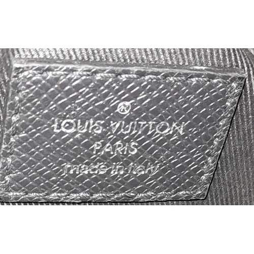 253 - Louis Vuitton Outdoor Messenger Bag.
A subtle tone-on-tone design with silver-colour hardware for a ... 