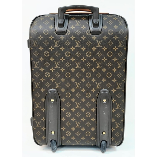 302 - A Louis Vuitton Monogram Canvas Pegase Rolling Suitcase.
37 x 55 x 20cm. Leather accents. Large outs... 