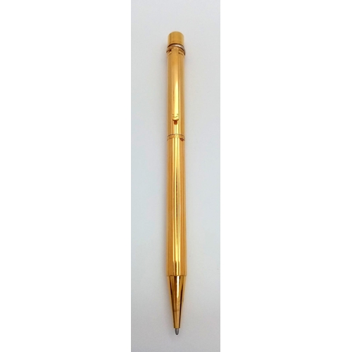 319 - A Cartier Santos Gold Plated Ballpoint Pen. In good condition and working order. Ref: 14893