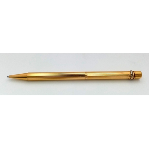 319 - A Cartier Santos Gold Plated Ballpoint Pen. In good condition and working order. Ref: 14893