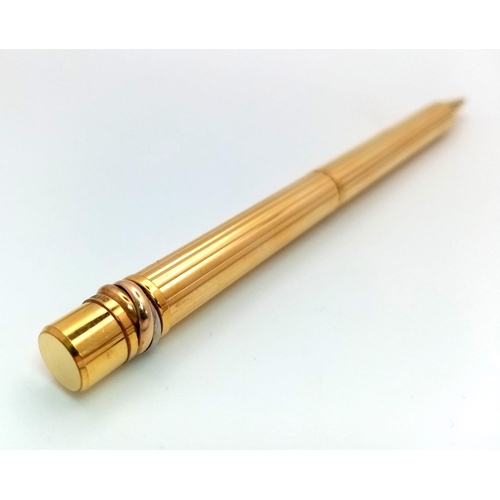 319 - A Cartier Santos Gold Plated Ballpoint Pen. In good condition and working order. Ref: 14893