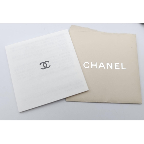 32 - A Chanel Taupe Half Moon Flap Bag. Caviar leather exterior with diamond quilting through the base an... 