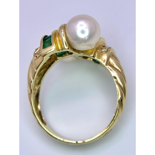 326 - A Fabulously Designed 14K Yellow Gold, Pearl, Diamond and Emerald Crossover Ring. Size N. 6.11g tota... 