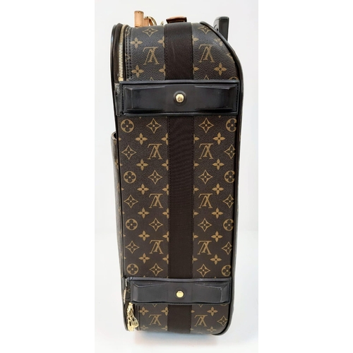 345 - Louis Vuitton Suitcase in famed LV monogrammed pattern.
Comes with Dust Cover, Lock & Key and a LV s... 